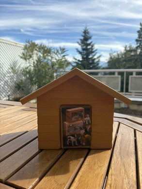 urne funeraire maison en bois avec vue montagne
